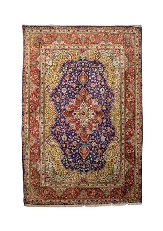 Tappeto persiano Tabriz - con medaglione blu centrato da rosone ruggine;...