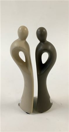 Coppia di sculture in ceramica raffiguranti figure (h cm 16) (lievi difetti)