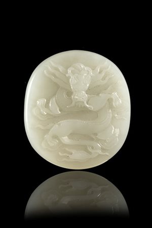 Placca in giada bianca con drago e bambù
Cina, secolo XX
(l. max 4,9 cm.)
