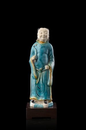 Scultura in ceramica, invetriatura a turchese raffigurante un dignitario reggen