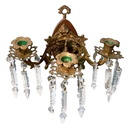 Applique in bronzo a tre luci con brindoli in vetro, XIX secolo. Base cm 16,...