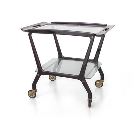 UN CARRELLO, anni '50.<br>Legno di mogano tinto 