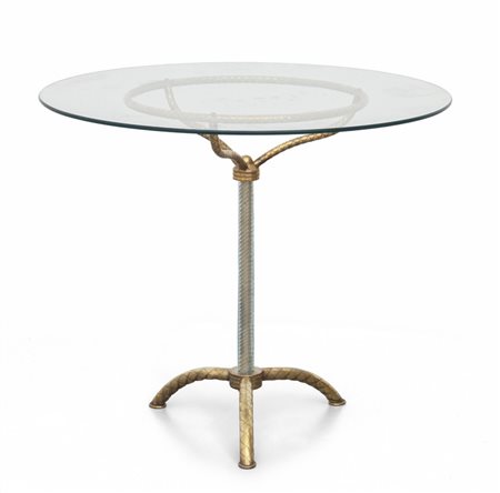  UN TAVOLINO, anni '50. <br>Ottone, cristallo, 