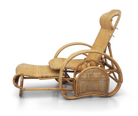 UNA CHAISE-LONGUE, anni '60. <br>Malacca, canna 