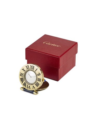 CARTIER
Orologio da viaggio in metallo
Anni '80
Movimento al quarzo
Quadrante b