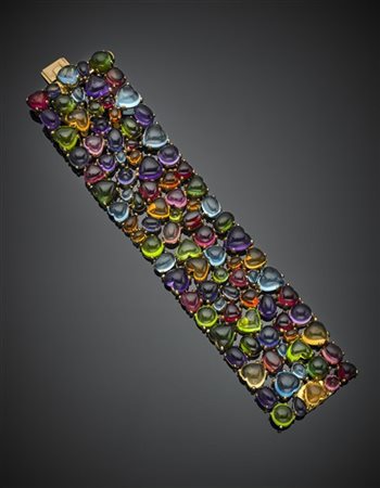 BULGARI
Bracciale "Allegra" in oro giallo rifinito con gemme di forme e dimensi