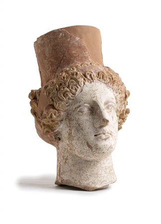 GREEK POLCROMY TERRACOTTA HEAD OF A GODDESS
4th - 3rd century BC
