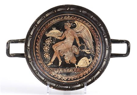 APULIAN RED-FIGURE STEMLESS KYLIX
Mid 4th century BC
