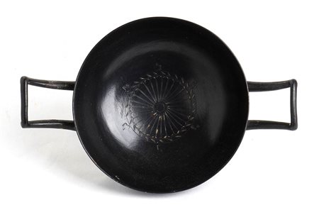 GREEK HELLENISTIC BLACK-GLAZED STEMLESS KYLIX
South Italy, 4th century BC

