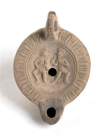 ROMAN OIL LAMP WITH GLADIATORS
1st - 2nd century AD
