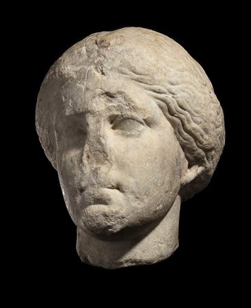 GREEK ATTIC MARBLE HEAD OF A WOMAN
4th century BC
