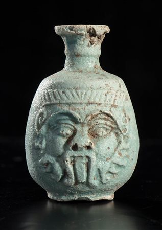 EGYPTIAN FAIANCE FLASK WITH BES PROTOME
Ptolemaic Period, ca. 332 - 30 BC
