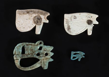 COLLECTION OF FOUR EGYPTIAN FAIENCE UDJAT EYES
Ptolemaic Period, ca. 332 - 30 BC
