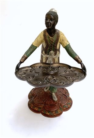 Arte del secolo XX. Scultura in metallo decorato a freddo raffigurante un moro