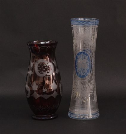 Manifatura di Boemia, lotto composto da due vasi in cristallo rosso rubino e tr