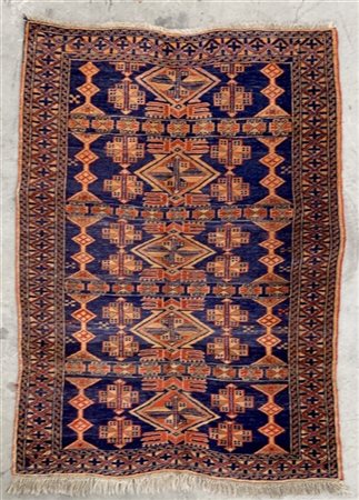 Tappeto Afghan, Turkestan occidentale, secolo XX.
Decoro geometrico nei toni de