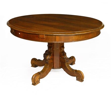 Tavolo con piano tondo allungabile in noce, gamba centrale ottagonale terminant