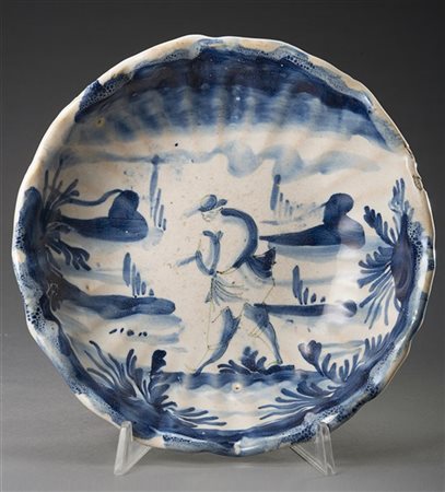 Crespina in maiolica con figura in un paesaggio in monocromia blu. Liguria, sec