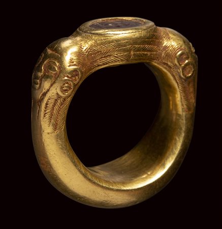 A rare etruscan agate intaglio set  in an ancient massive gold ring. Silenus.