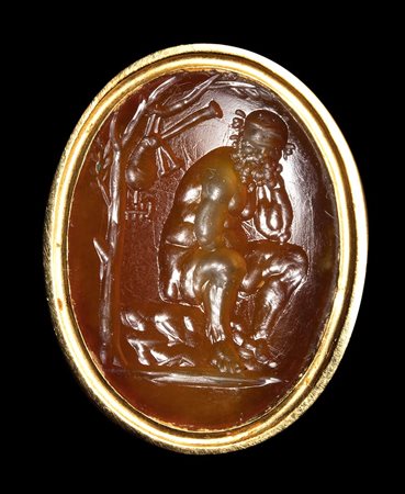 A very fine hellenistich jacinth intaglio. Seated satyr. 