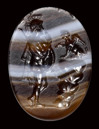 A fine roman italic banded agate intaglio. Oedipus with the Sphinx.