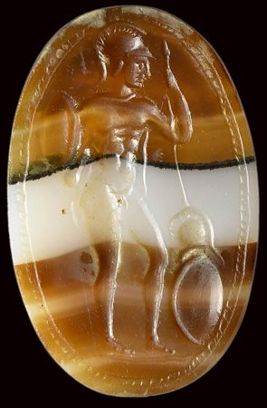 A fine and large banded agate roman italic  intaglio. Warrior. 