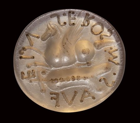 A roman italic chalcedony intaglio. Pegasus with inscription and allegorical  attributes. 