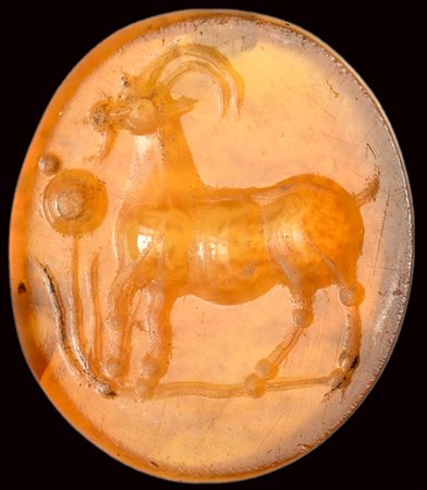 A roman italic carnelian intaglio. Antelope with poppy flower. 