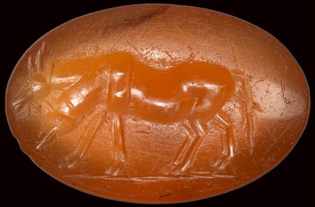 A roman carnelian intaglio. Two heifers. 