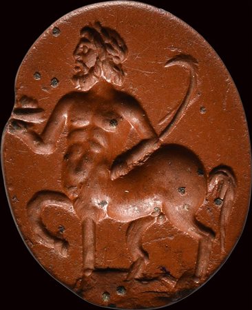 A fine roman red jasper intaglio. Centaur with attributes. 