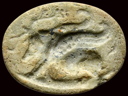 A roman glass paste intaglio. Winged sow.