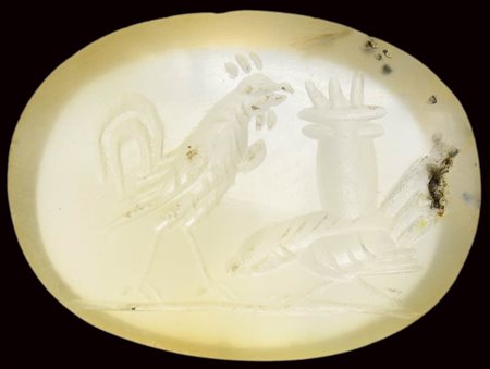 A roman chalcedony intaglio. Two cocks. 
