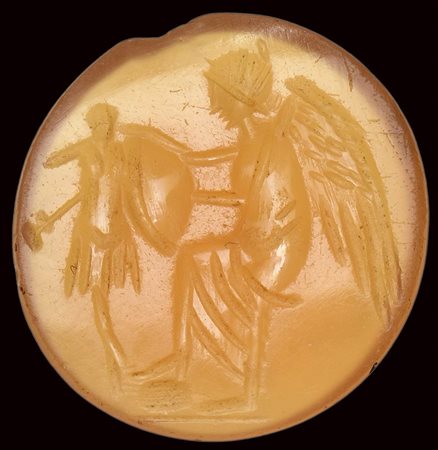A roman carnelian intaglio. Victory with a trophy. 