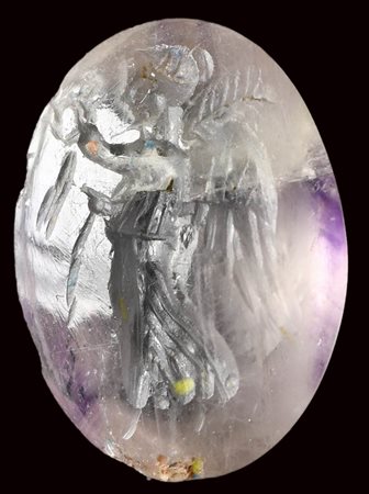 A roman late republican amethyst intaglio. Victory with attributes. 
