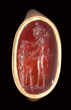 A roman carnelian intaglio set ina modern gold ring. Homoerotic "paiderastia" scene. 