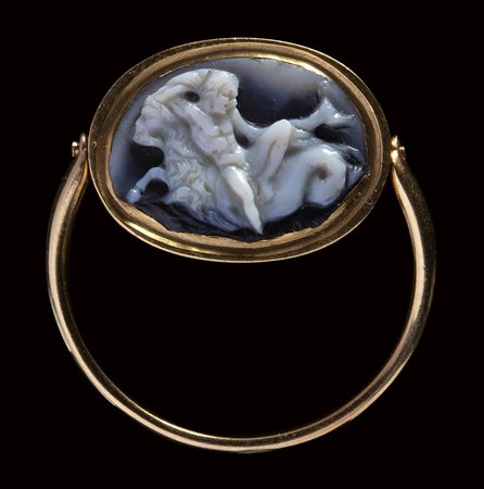 An roman agate cameo mounted on a modern gold ring. A youth on a seagoat.