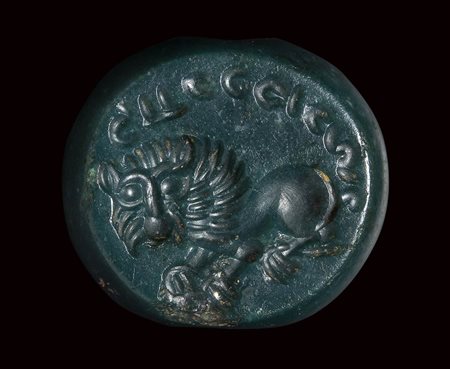 A sasanian green jasper stamp-seal. Lion and inscriptions.