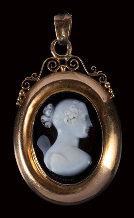 A neoclassical two-layers agate cameo mounted on a gold pendant. Bust of Psyche. Signed Girometti.