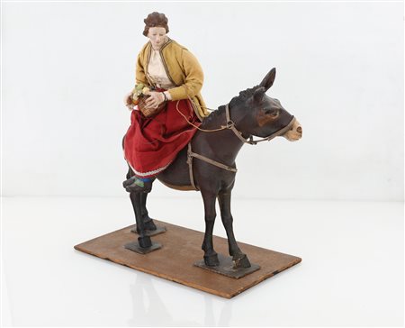 Giovane popolana su un mulo, recente fattura - giacca beige con ricami...