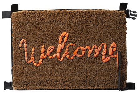 Banksy "Welcome Mat" 2019
tappeto fatto a mano con giubbotti di salvataggio dei