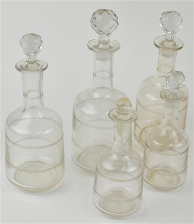 LOTTO DI 5 BOTTIGLIE in vetro con tappo in cristallo Italia, prima meta' XX...