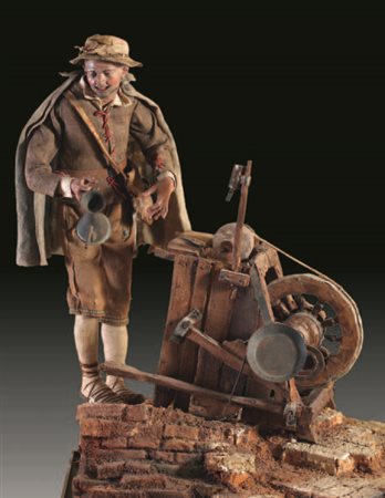 Arrotino, rustico indossante pantaloni e giacca in tela beige e mantello...