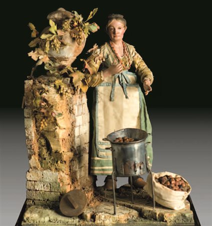 Contadina in abiti da festa, il corpetto in tessuto operato, gonna azzurra e...