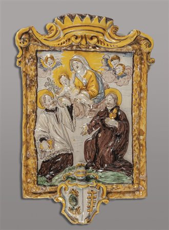 Placca in maiolica policroma raffigurante Madonna 
