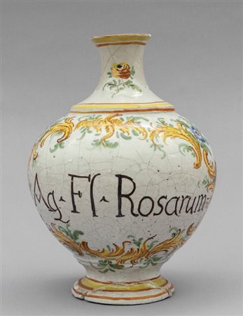 Bottiglia in maiolica con iscrizione medicinale 