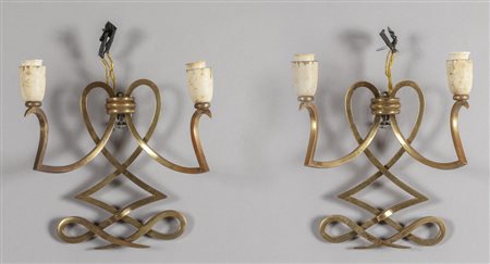 Coppia di apliques decò in bronzo dorato a due 