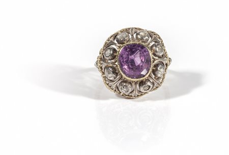 Anello in oro giallo e bianco con pietra rosa di 