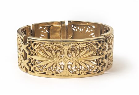 Particolare bracciale in oro giallo di forma semi 