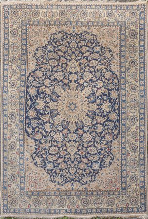 Tappeto persiano a fondo blu<br>cm. 160x286