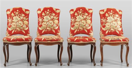 Quattro sedie Luigi XV in noce imbottite, 